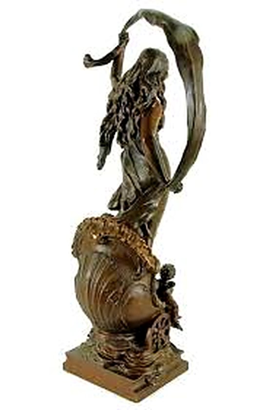 Bronze statue of the goddess Aurora rising above a cresting wave, veil streaming overhead